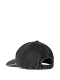 OUR LEGACY baseball cap in cotton satin with enzyme wash